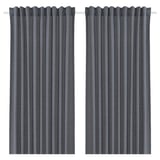 Dark grey curtains, solid color, rectangular, made from recycled work clothes.