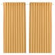 Two beige curtains hang side by side. They are solid, rectangular, and feature a rod pocket design, typically used for privacy and light control.