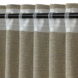 Close-up of hanging curtains with yellow and blue fringes, showcasing recycled fabric texture and pleated design.