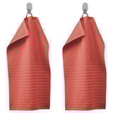 Two red VÅGSJÖN towels hang with hooks, soft and quick-drying terry.