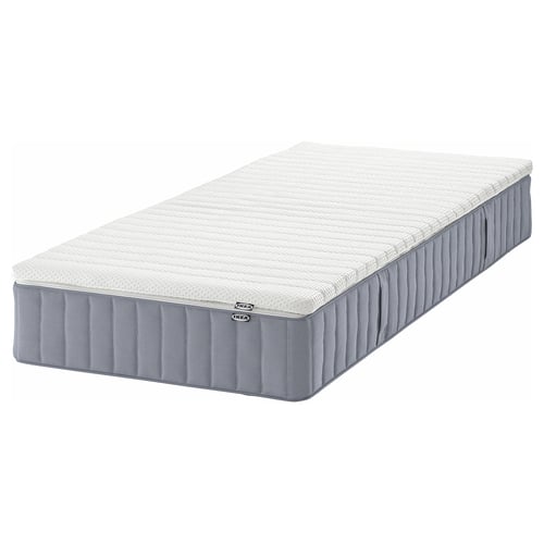 IKEA valevag mattress: white, rectangular, with grey sides, pocket springs, breathable, firmer feel.