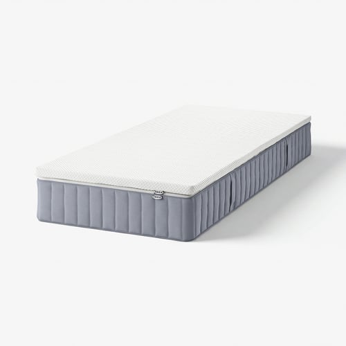 IKEA VALEVÅG pocket spring mattress, white, rectangular, grey trim.
