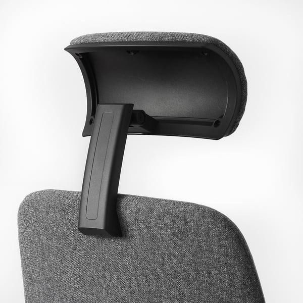 Ergonomic chair detail: adjustable headrest supports neck comfortably. Black upholstery, sturdy armrest.