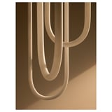Varmblikt lamp: 3 u-shaped frosted glass arms emit warm led light.