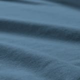 Close-up of soft, textured cotton jersey fabric, showcasing its smooth, warm, and stretchy quality.