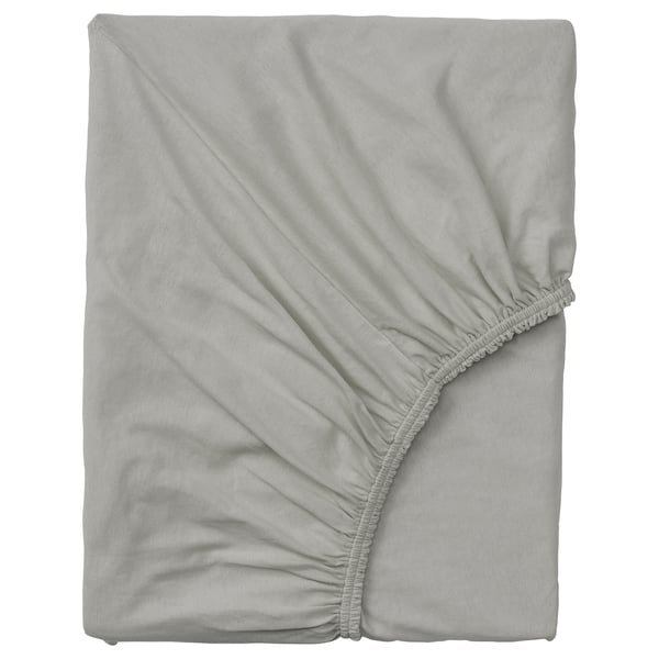 A grey VÅRVIAL fitted bed sheet made of 100% cotton. Its designed with elastic edging for a secure fit on mattresses up to 16 cm thick.
