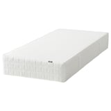 White IKEA mattress with quilted sides, rectangular, memory foam padding.
