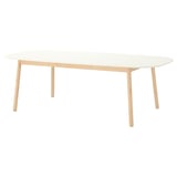 Elegant rectangular dining table with white top and light wood legs, modern minimalist design.