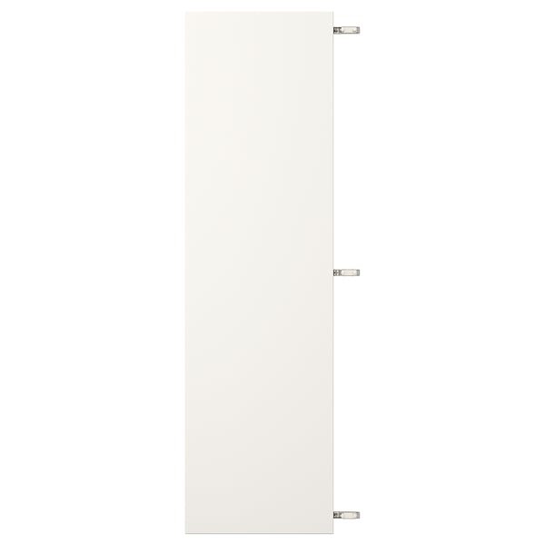 White VEDDINGE cabinet with nickel hinges.