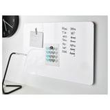 White magnetic board with weekly planner and notes, ideal for organizing tasks and reminders in kitchen or hallway.