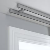 Image shows VIDGA ceiling brackets for dual curtain rails, offering light and privacy control.