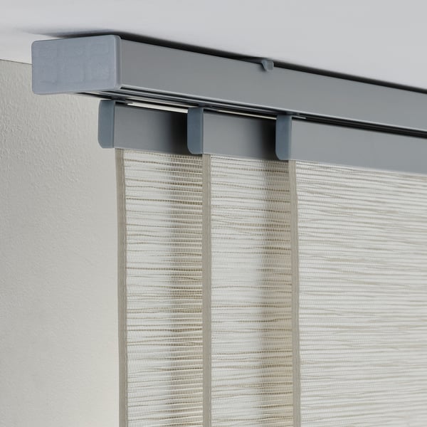 Close-up of VIDGA curtain rail system, featuring adjustable track and connectors, demonstrating easy installation and flexibility.