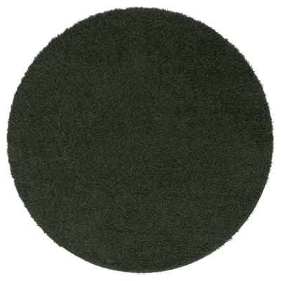 Dark green, round rug, soft texture, plain design.