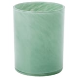 Green, cylindrical glass candle holder with swirl design.