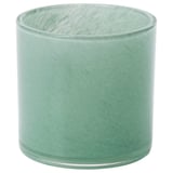 Green glass cylindrical tealight holder with textured design.
