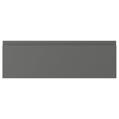This image shows a dark gray VOXTORP kitchen cabinet front with a smooth surface and integrated handles.