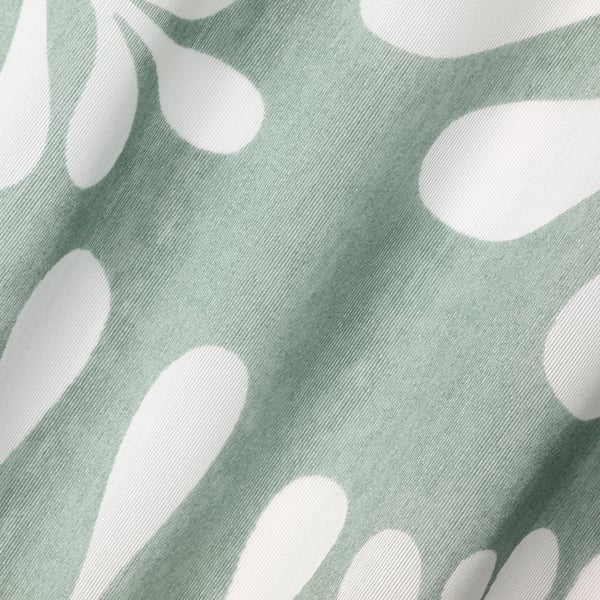Green sheer curtains with abstract shapes. Recycled polyester fabric.