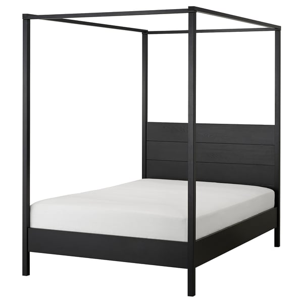 YTTERVÅG black wooden bed, modern four-poster design, high headboard, solid pine, square shape.