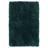 Fluffy blågrøn bademåtte, rektangulær, blød høj luv. Fremstillet af genanvendt polyester, kan maskinvaskes.