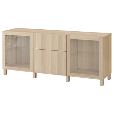 Ikea BESTÅ lysebrun opbevaringsmøbel i træ med glaslåger og skuffer.