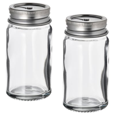 To tomme CITRONHAJ krydderiglas med sølvlåg, stående side om side, klart glas, cylindrisk form, enkelt design.