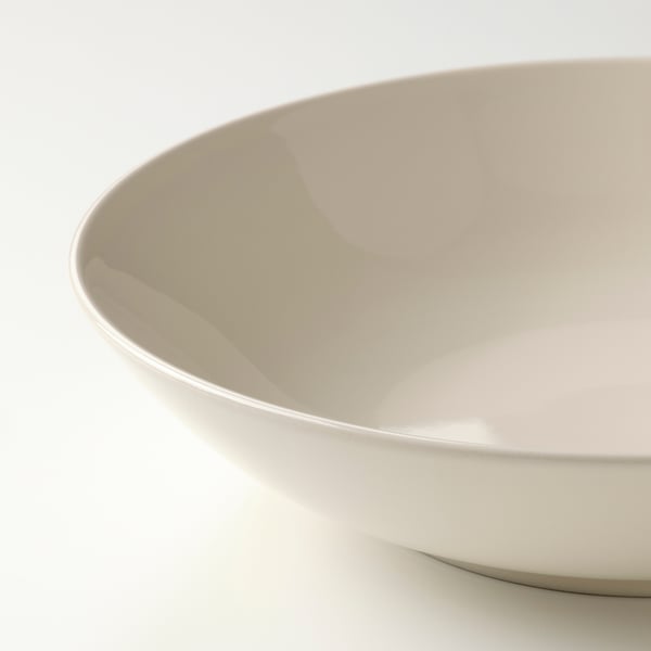 Glat, blank, råhvid stentøjsskål med buede kanter. Minimalistisk design af høj kvalitet.