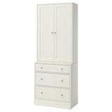 Dette billede viser et HAVSTA højt hvidt skab med skuffer. Den har et rent, moderne design lavet af fyrretræ og fiberplader.