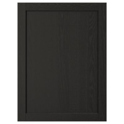 Sort træskabslåge med massiv træramme og skrå kanter. Et traditionelt design med finerpanel.
