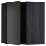 Ikea METOD vægskab i mørkegrå. Rektangulær form med en åben dør, der viser en reol indeni. Moderne og slankt design.