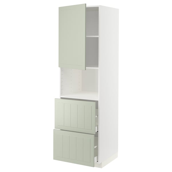 Et ikea METOD køkkenskab i lysegrøn med hvid ramme og to skuffer med et moderne og håndværksmæssigt design.