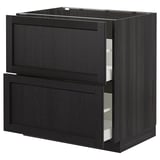 Sortbejdset træ køkkenskab med to åbne skuffer, en del af METOD-serien, moderne og traditionelt design.