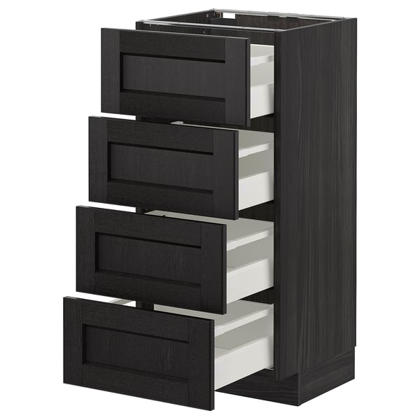 Sort ikea METOD køkkenskab med 4 delvist åbne skuffer.