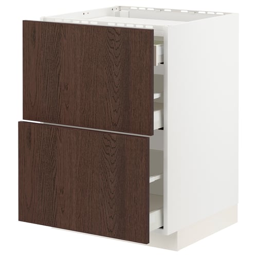 Mørkebrune træskuffer på hvidt rammeskab, minimalistisk køkkendesign.