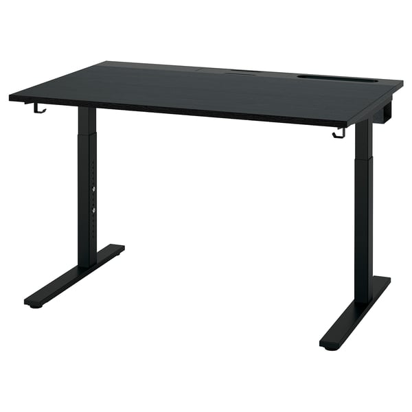 Et sort MITTZON højdejusterbart skrivebord med metalben og en mørk træplade. Det inkluderer kabelstyring og kroge, designet til ergonomisk brug.