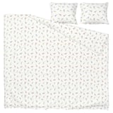 Et hvidt sengesæt med farverige blomstermønstre på dyne og pudebetræk, fremstillet af en åndbar blanding af bomuld og viskose.