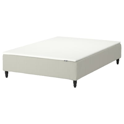 En IKEA RENFJÄLLET madrasbund, hvid, med træben og en blød topmadras, rektangulær form.