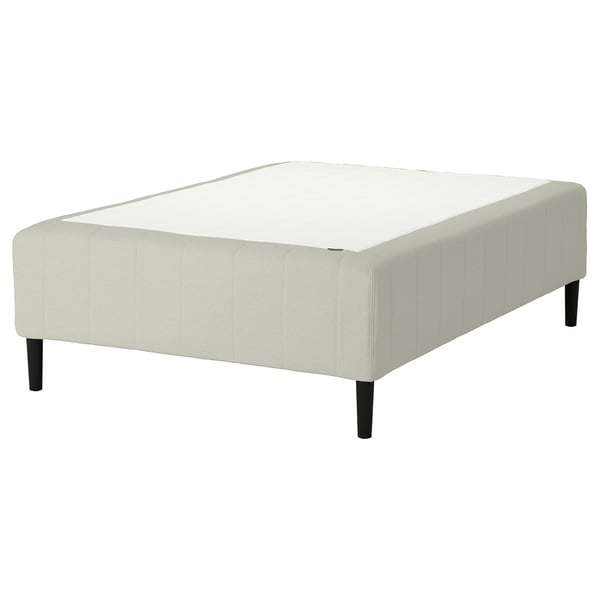 RISHÖJDEN sengebunden er hvid og har et moderne polstret design med robuste sorte ben og et quiltet mønster, der giver et rent, moderne look.