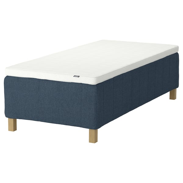 En RISHÖJDEN seng i blå med en hvid madras, der giver støtte med pocketfjedre og et moderne design.