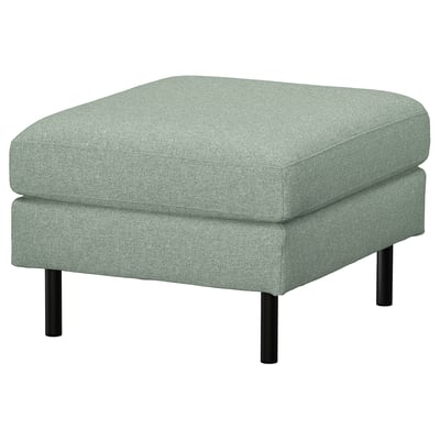 Lysegrøn fodskammel med slanke metalben. Moderne minimalistisk design, perfekt til ekstra siddepladser.