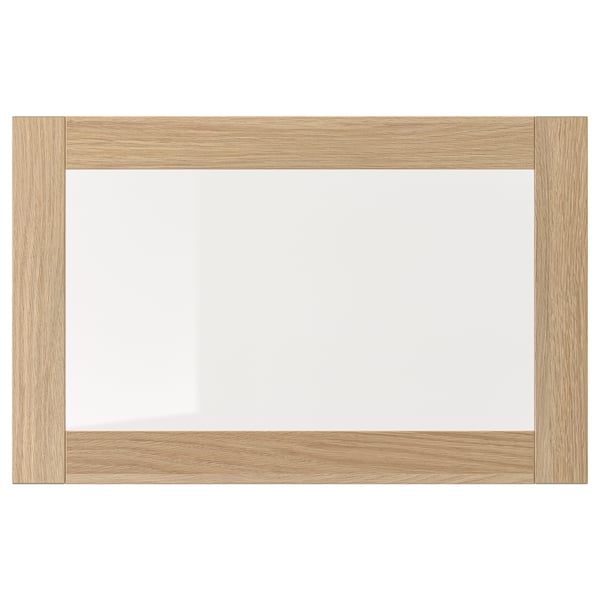 SINDVIK: egetræsstel med front i klart glas, minimalistisk design.