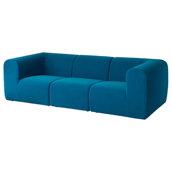 STOCKHOLM 2025 sofa: moderne, blå, l-formet, med afrundede kanter, der giver komfort og stil.