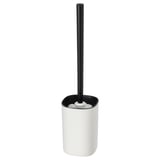 En STORAVAN toiletbørste med sort håndtag og hvid holder. Moderne, minimalistisk design. Lavet af slidstærkt plast.