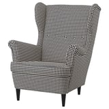 STRANDMON stol, sort/hvid houndstooth mønster, høj ryg, træben, hyggeligt design.