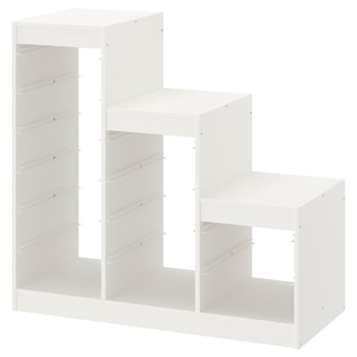 En hvid TROFAST opbevaringsramme med tre sektioner, perfekt til at organisere børnelegetøj.