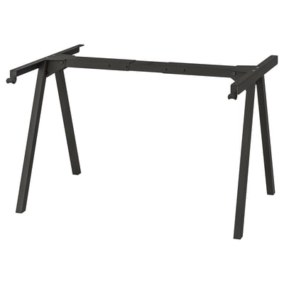 Et TROTTEN justerbart sort skrivebordsstel med et slankt design med fire robuste ben for stabilitet.