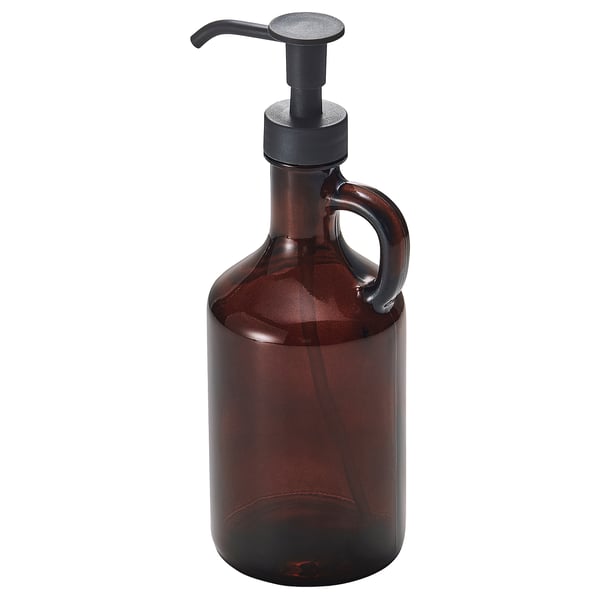 En VÄLVÅRDAD sæbedispenser, mørkebrun, med et klassisk design. Det er en glasflaske med en pumpe i rustfrit stål.