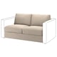 En beige VIMLE sofa med et moderne design. Den har et blødt stofbetræk, firkantede arme og et behageligt, indbydende look.