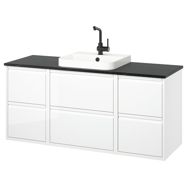 White ÄNGSJÖN bathroom cabinet with marble counter and sink, matte black faucet.