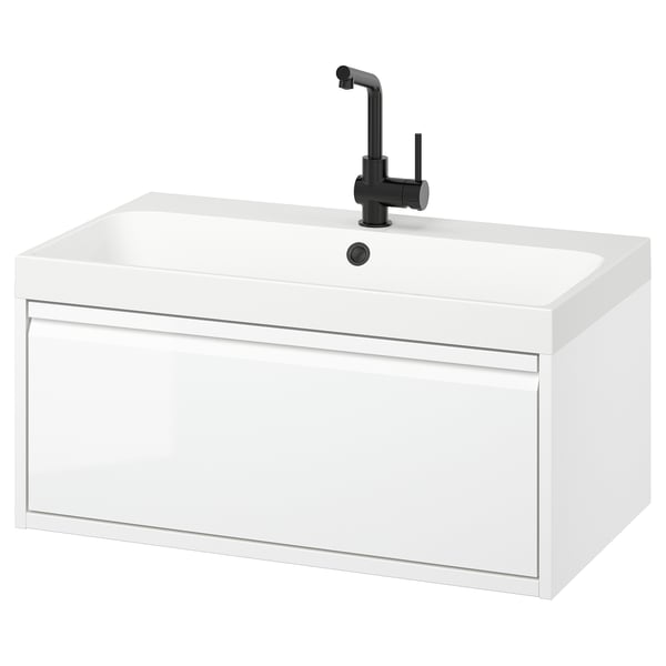 Modern white bathroom vanity, single drawer, sleek edges, wall-mounted with black tap.