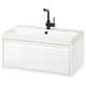 Modern white bathroom vanity, single drawer, sleek edges, wall-mounted with black tap.